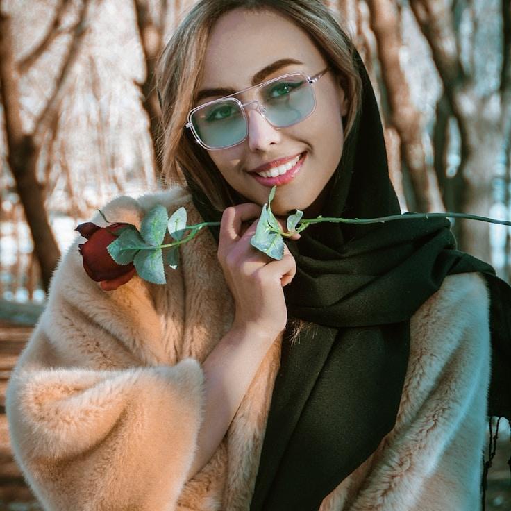 Amina Rai, Lead Design Curator at Silver Horizon Notes, reviewing corporate floral arrangements